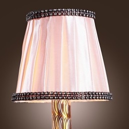 Elegancka kryształowa lampa ścienna w kolorze różowym