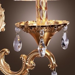 Elegancka kryształowa lampa ścienna w kolorze różowym