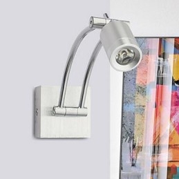 Kreatywna lampa ścienna z ramieniem bujanym przy łóżku