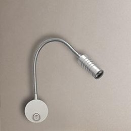 Lampa ścienna Lampa ścienna Głowy Węża Łóżko jest oświetlona przez lampę do czytania