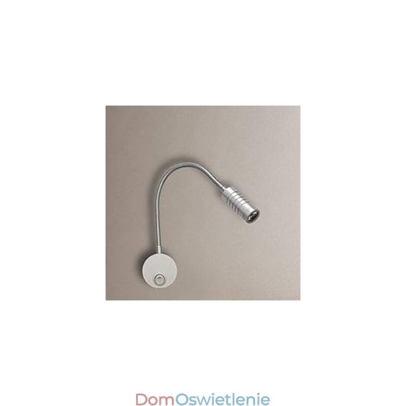 Lampa ścienna Lampa ścienna Głowy Węża Łóżko jest oświetlona przez lampę do czytania